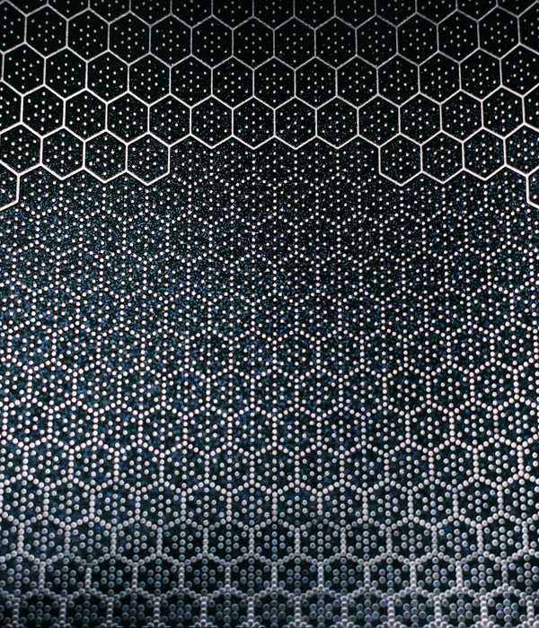 Abstract hexagonal metal pattern with textured surface. Ideal for design and technology backgrounds.